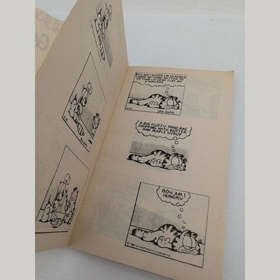Garfield Here We Go Again by Jim Davis (Paperback, 1989) comic strip humor by Jim Davis