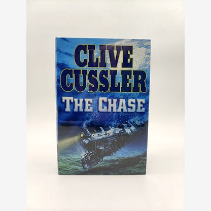 The Chase (an Isaac Bell Adventure) by Clive Cussler, Adventure Signed by Clive Cussler book cover
